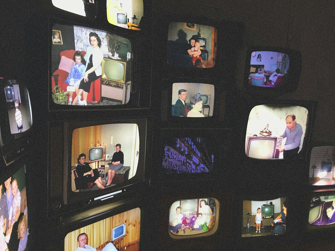 family watching old tv
